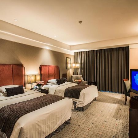 Ruiwan New Century Hotel Tianjin Bagian luar foto