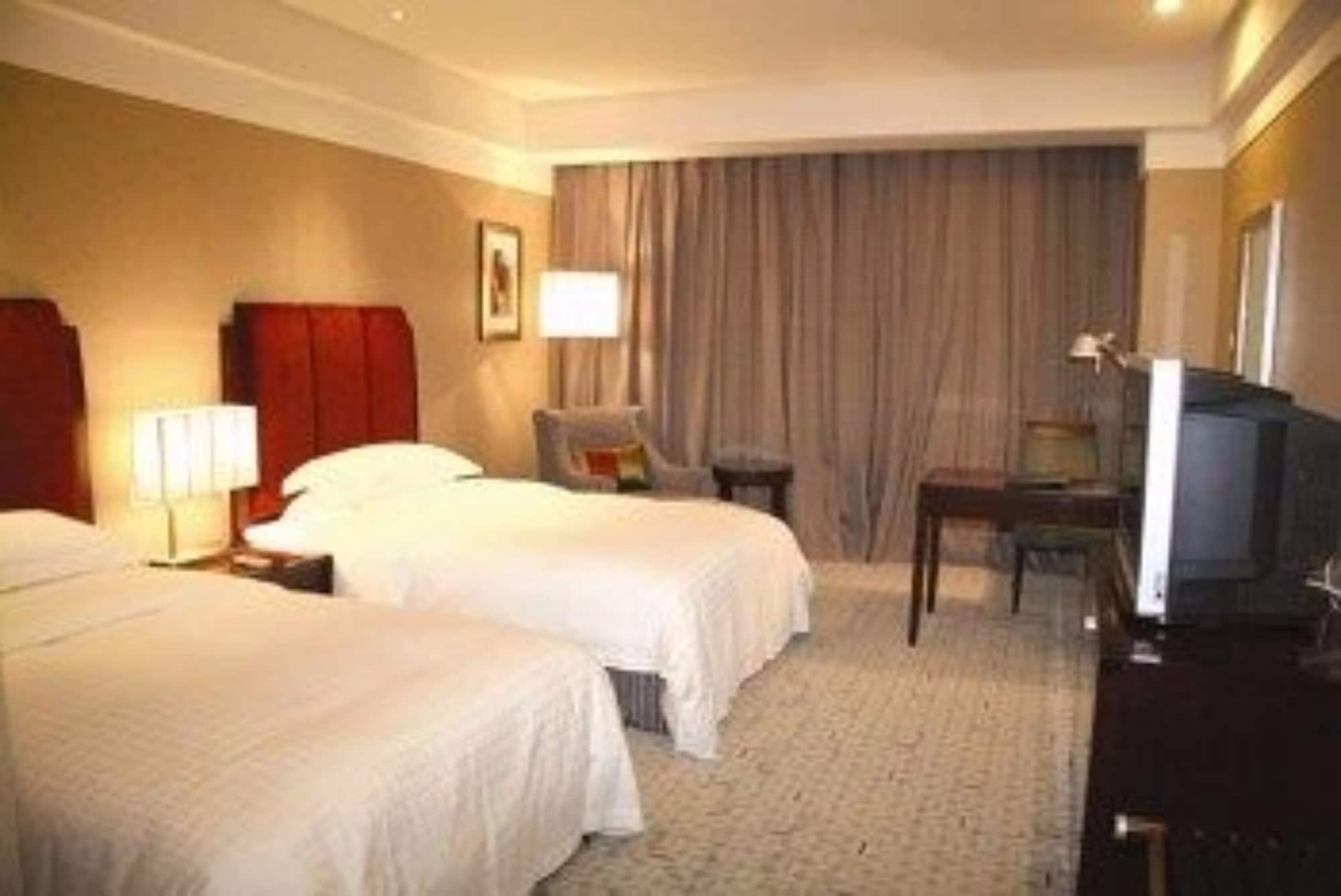 Ruiwan New Century Hotel Tianjin Bagian luar foto